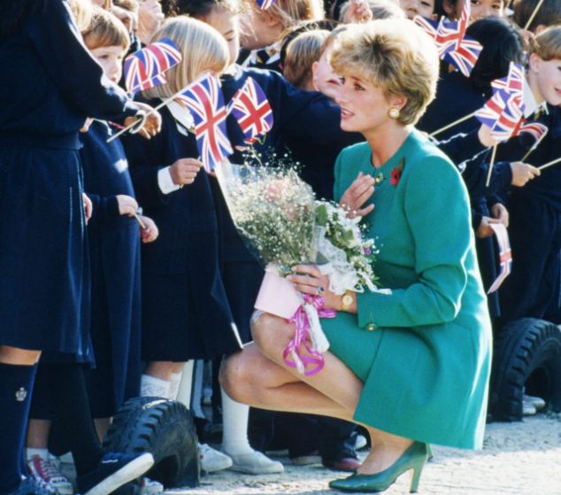 Diana charms children in Korea in 1992, cutting a strikingly similar figure to that of Kate