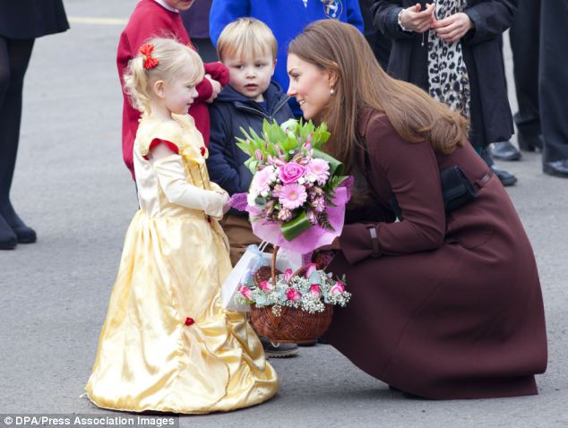 The Duchess of Cambridge with youngsters in Grimbsy last year during an official visit to the town