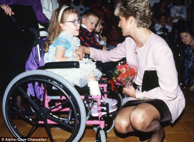 Diana meets a youngster in a wheelchair, also in Canada, in 1991