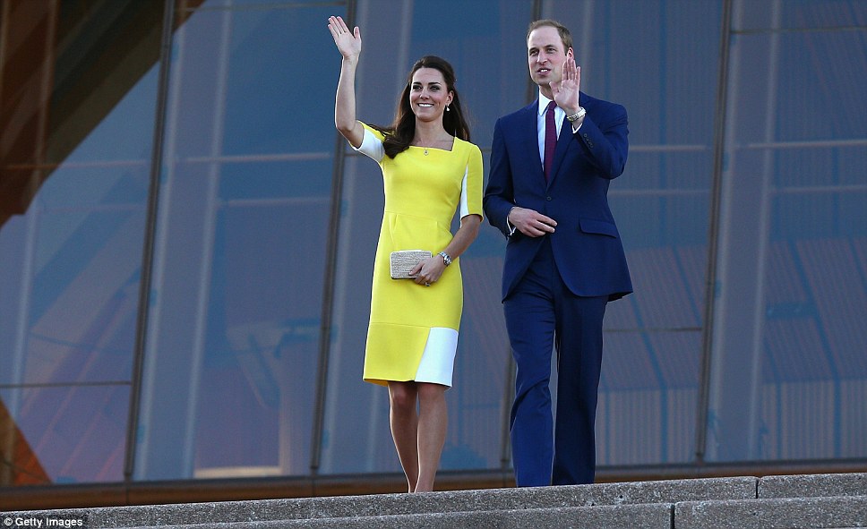 Just the two of us: The Duke and Duchess of Cambridge walk down the stairs of the Sydney Opera House, while George is taken to the car by his nanny