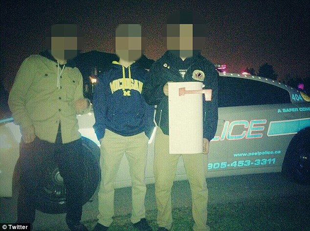 Numerous party goers had no issue posting the damage on Twitter, with this shot showing three young men with holding the house's letterbox