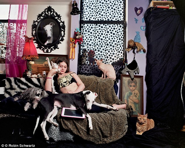 Amelia Forman poses with the family pets