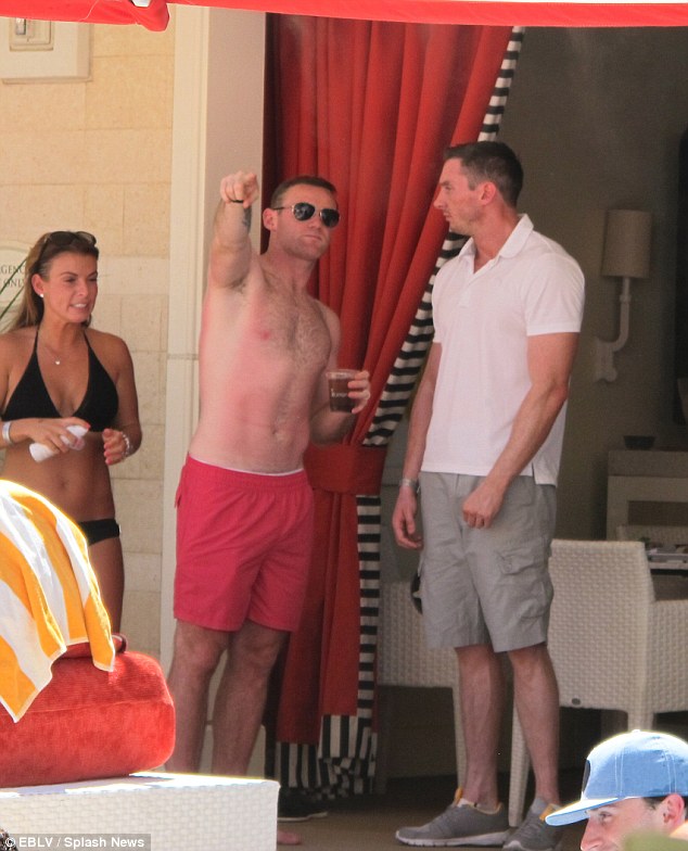 Time to relax: Wayne and Coleen Rooney opted to recover from England¿s bitterly disappointing Brazil World Cup exit with a trip to Las Vegas
