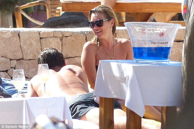 She's got it: Kate looked effortlessly chic with her hair slicked back with water