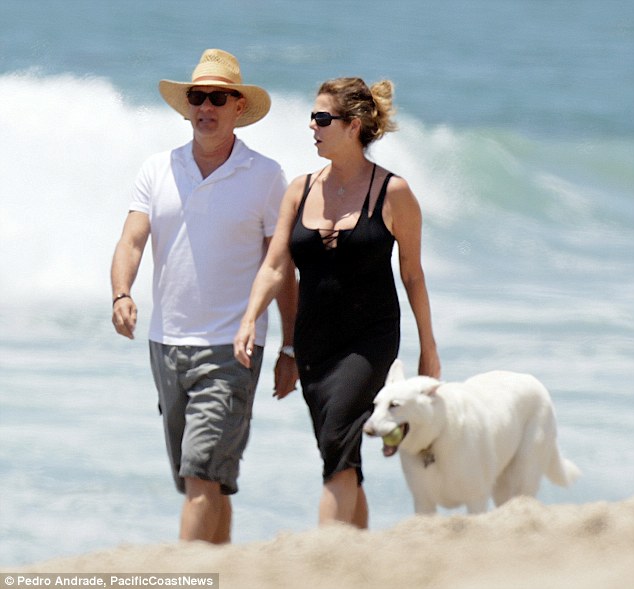 Anyone for tennis? His adorable pooch seemed desperate for someone to throw his ball in the water