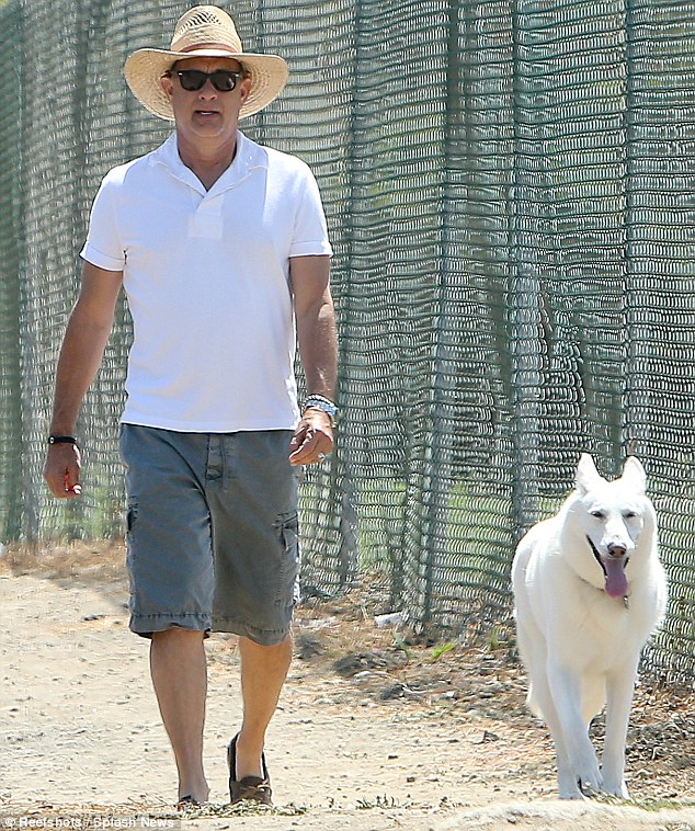 Going solo: No doubt the Oscar winner was appreciating the peace and quiet as the walk continued