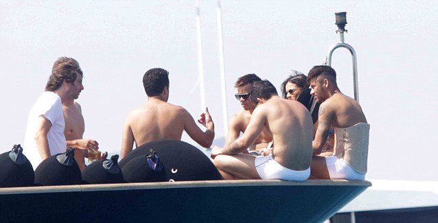 Chilling out: Neymar his girlfriend Bruna Marquezine and a group on a boat