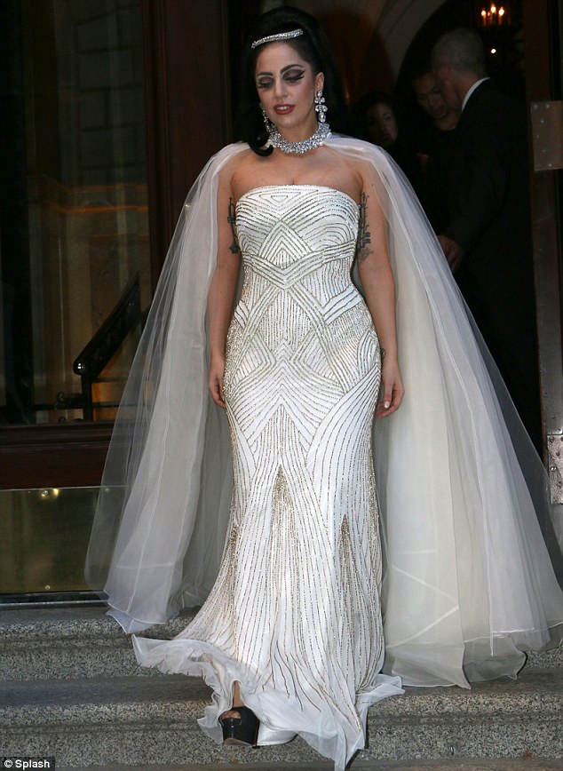 Marry The Night! The eccentric singer undoubtedly turned heads in the white number ahead of her duet with Tony Bennett