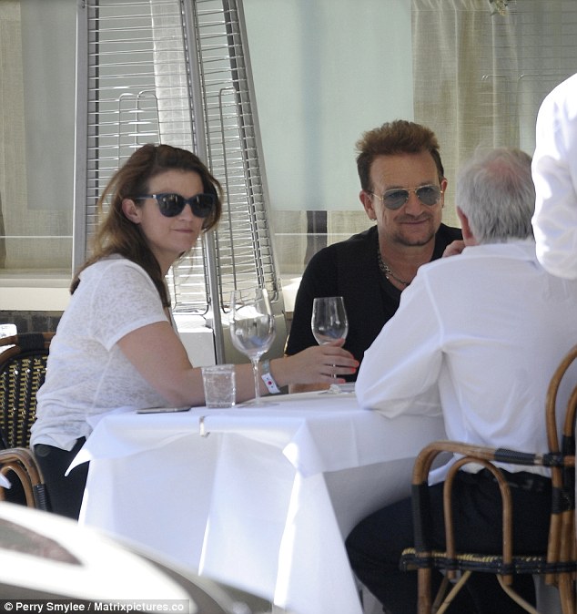 Thoughtful: Bono recently revealed that he and his family often get together to pray for those who are suffering