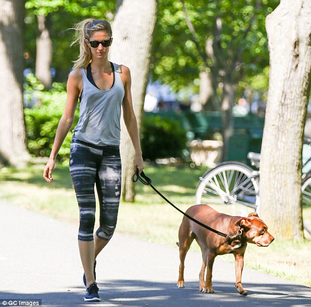 No rest for the ridiculously good-looking! Gisele Bundchen looked every inch the stunning supermodel as she took her beloved pit bull Lua for a walk in the park in their hometown of Boston, Massachusetts on Saturday
