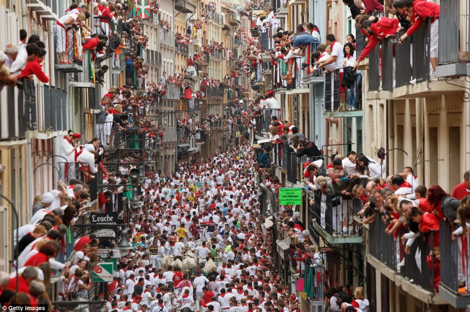 The festival was taking place as thousands raced alongside fighting bulls through the streets of the northern Spanish city of Pamplona
