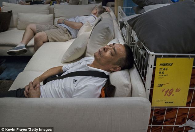 Siesta sofa: There is plenty of room in the huge Beijing store - one of the world's largest - for all the sleepers