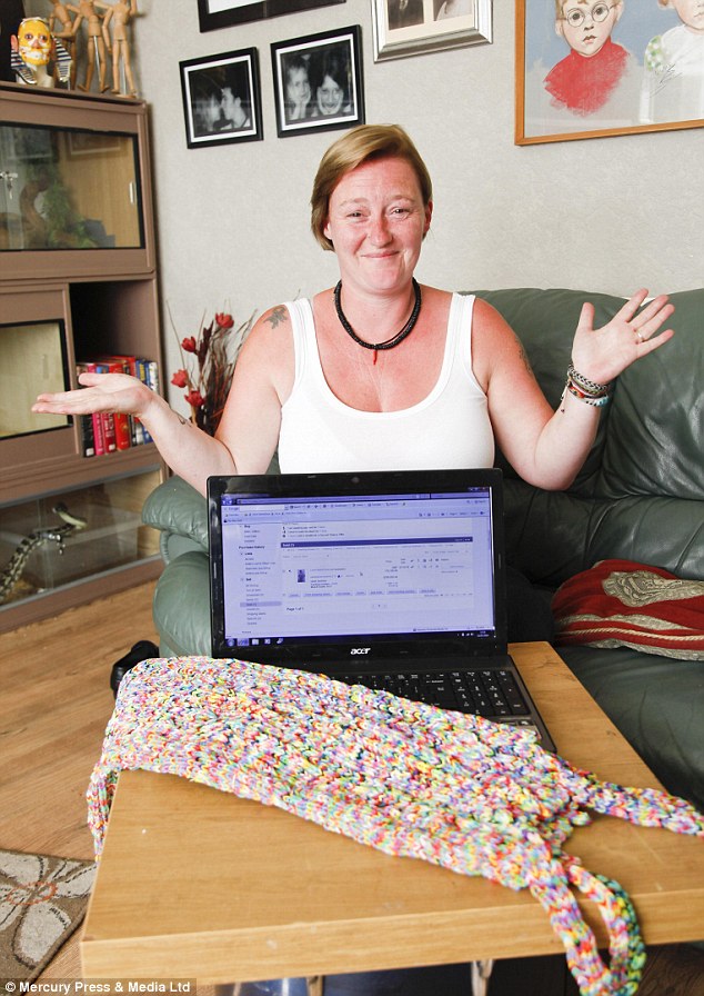 Shocked: Helen Smith, 42, put the dress, made entirely from loom bands by her friend Katherine, on eBay