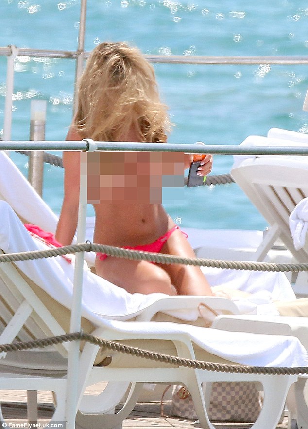 Daring to bare! The 21-year-old showed off her incredible figure in nothing more than a pair of skimpy pink bikini pants 