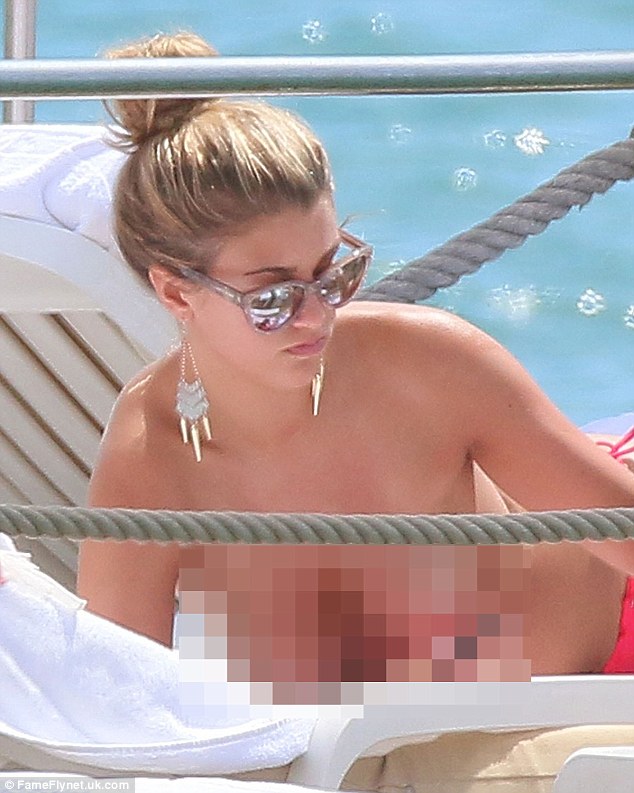 Laid back look: The Miss Universe Great Britain champ swept her luscious blonde locks into a high bun