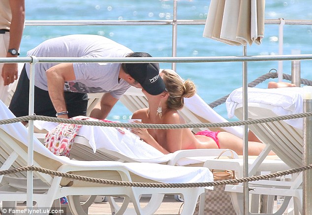 New flame: Amy was joined by a mystery man and the pair were very affectionate 