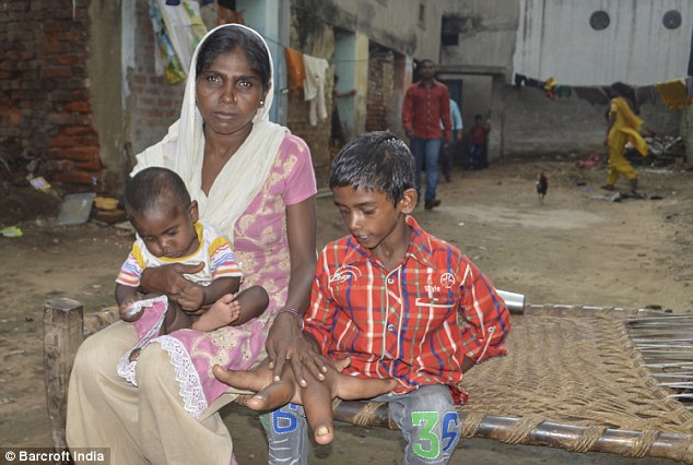 His mother Haleema, 27, (pictured with Kaleem and another one of her children) said she feels 'powerless'