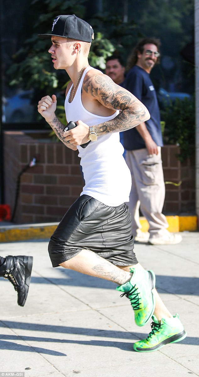 Street life: Justin Bieber takes an afternoon jog in West Hollywood