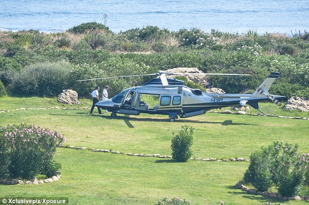 Approach: This wider shot shows the green-grassed landing pad that the Microsoft billionaire's helicopter waited for him on. Gates held the title of 'richest man in the world' for 15 out of the past 20 years, but he was succeeded- briefly- by Mexican telecommunications magnate Carlos Slim Helu for the past four years