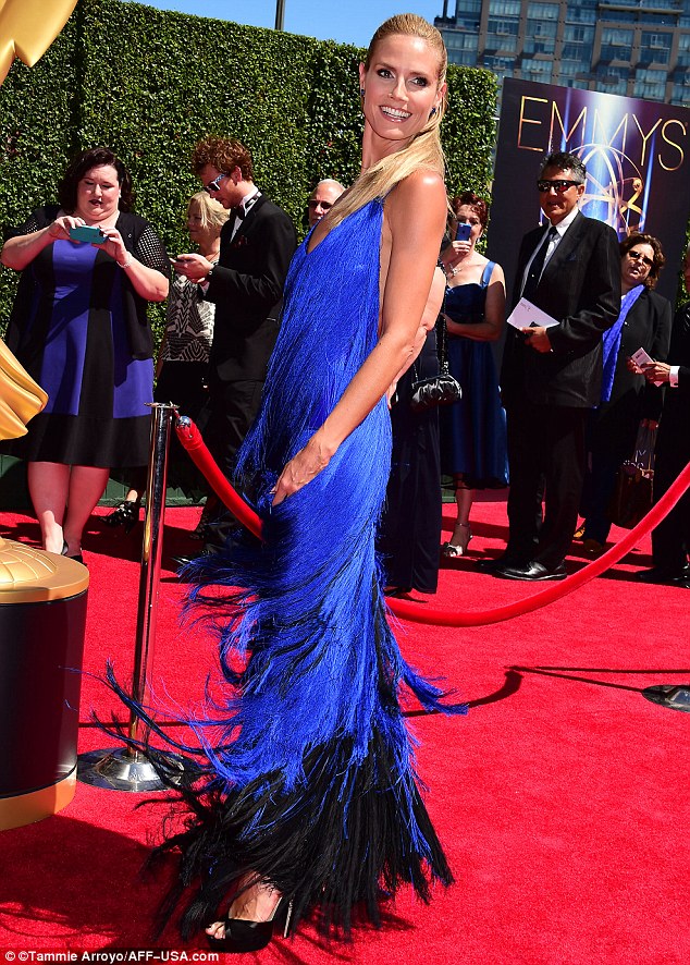 Long hair don't care: Heidi appeared to be wearing extensions in her blonde tresses too