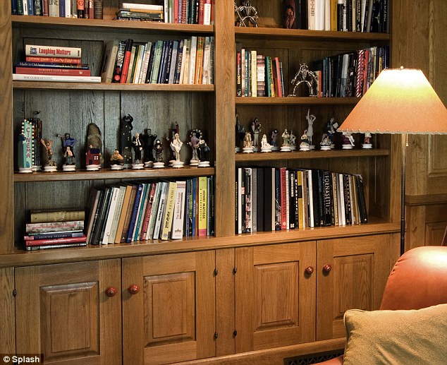 Just like him: The intimate space includes both thought provoking tomes and funny Hollywood figurines, allowing the space to be both serious and silly at the same time