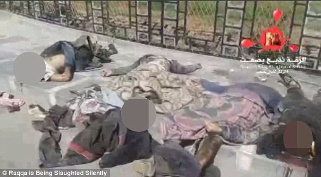 The decapitated bodies of Syrian soldiers were left scattered in the streets of Raqqa by ISIS fighters 