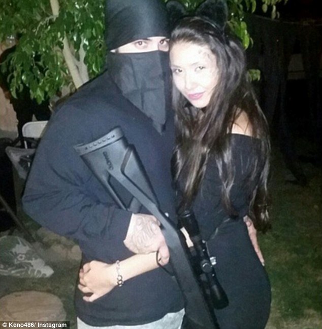 'We both needed an escape': This Instagram user posted this picture wearing an Islamic militant-style outfit with the message: 'Me and the mother of my beautiful having a great time at Halloween party #ISIS #TERRORIST