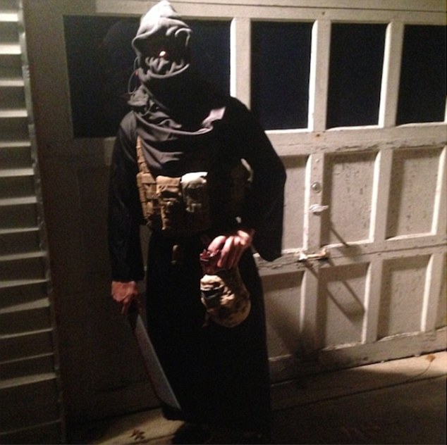 Macabre: Another sickening Halloween costume is created to look like an ISIS fighter decapitating a prisoner
