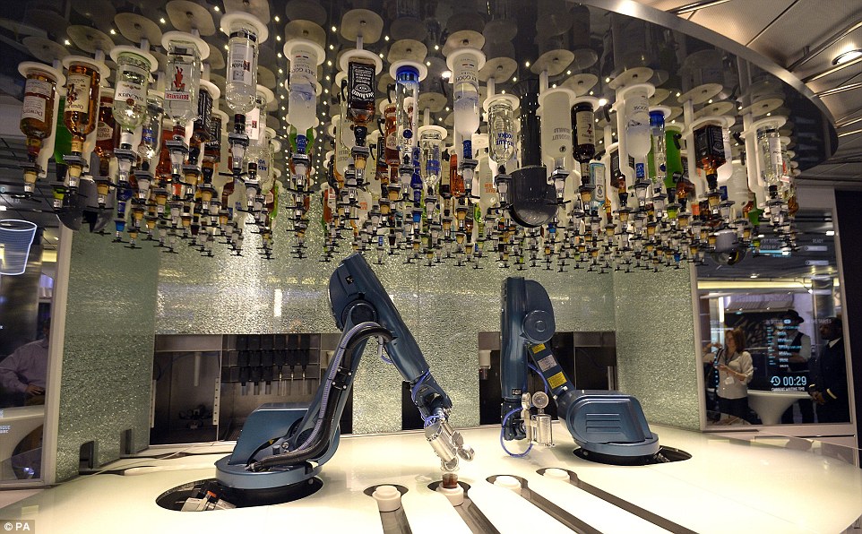 Cutting-edge technology: The whirring blue robotic arm bartenders that shake and stir your poison according to your tastes