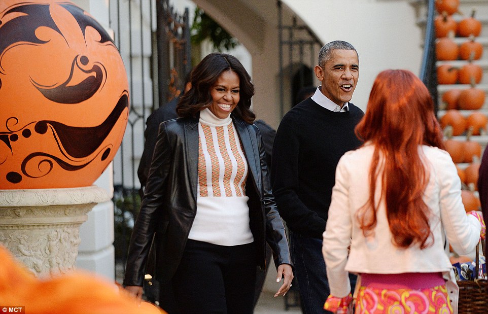 Greetings!: The President and the First Lady come outside to greet the gatherers