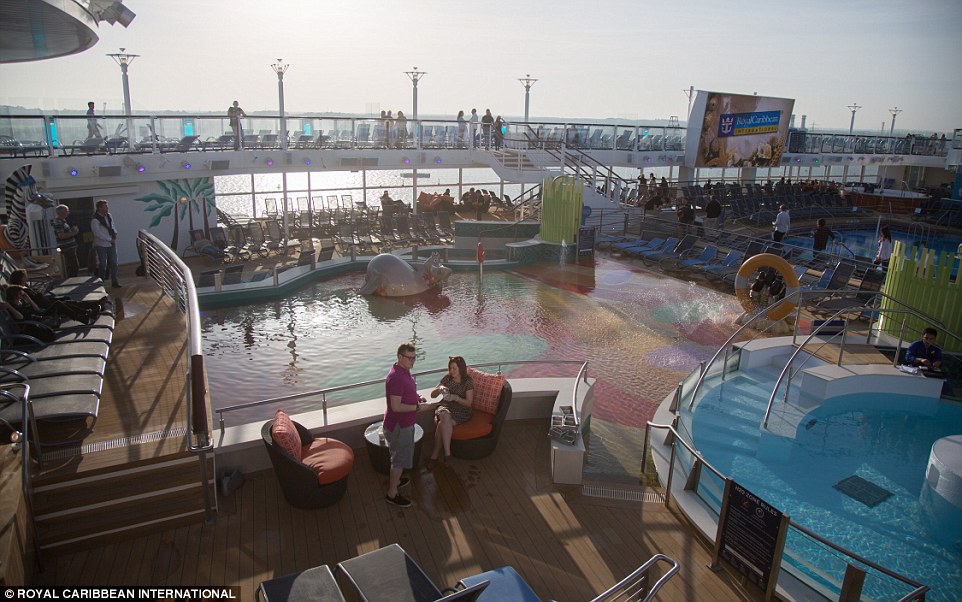 Guests can find swimming pools, sunbeds and hottubs - as well as a bar playing serving drinks throughout the day on Deck 15