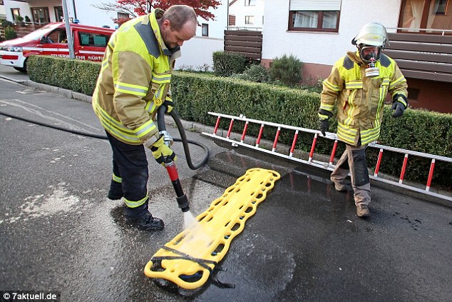 Firefighters were later seen hosing off the equipment used to hoist the foul-smelling man from the apartment