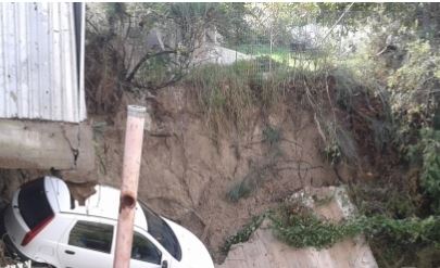 ΦΩΤΟ-“Άνοιξε” η γη στη Ρόδο από τις καταρρακτώδεις βροχές