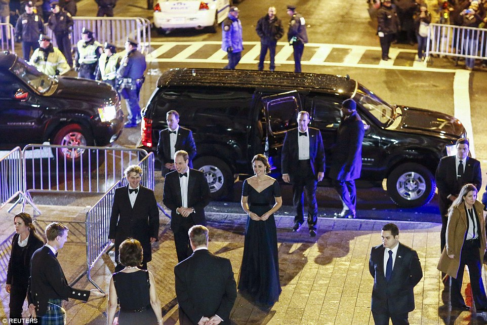 Drawing a crowd: This distant shot shows the royal couple arriving at the Metropolitan Museum of Art in Manhattan, New York, tonight