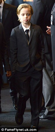 Confident: The self-possessed girl developed her unique, androgynous style early on and it reportedly confused her conservative Republican grandmother Jane Pitt (pictured November 21 & February 5)