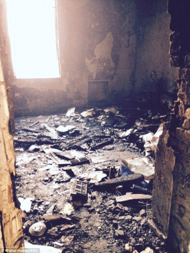 Devastation: Mrs Kazi's office, where a terrorist blew himself up during a nine-hour rampage 