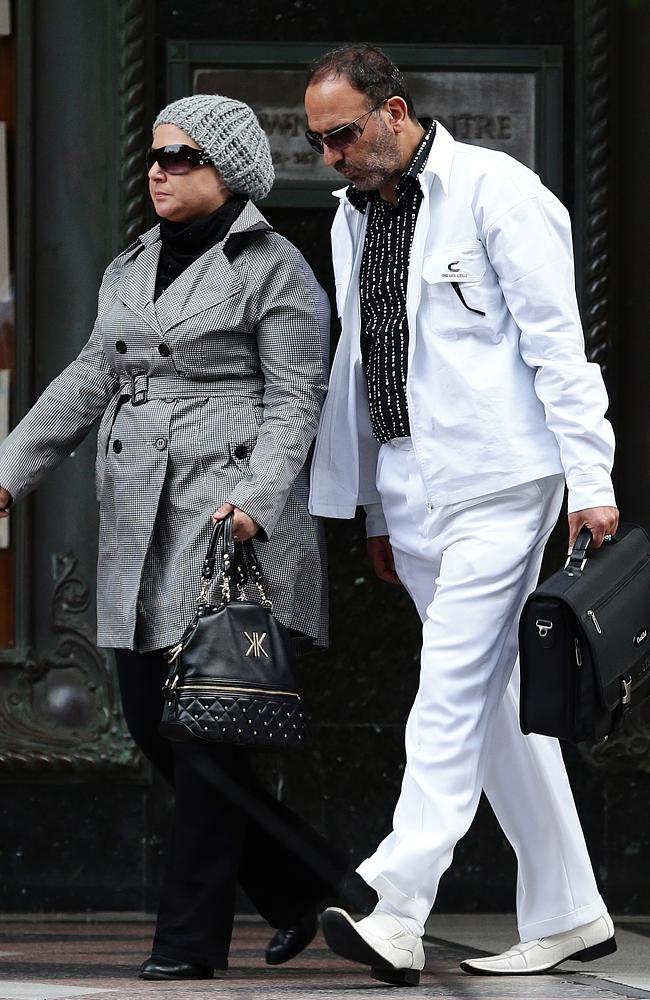 Man Haron Monis (right) and Amirah Droudis leave Downing Centre Court in Sydney on the fi