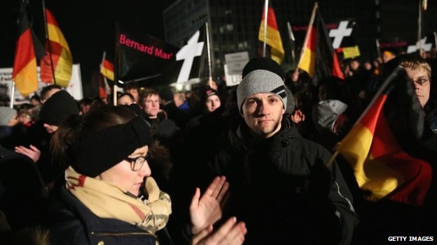 DRESDEN, GERMANY - JANUARY 12: Supporters of the Pegida movement march to show their solidarity with the victims of the recent Paris terror attacks during their weekly march on January 12, 2015 in Dresden, Germany