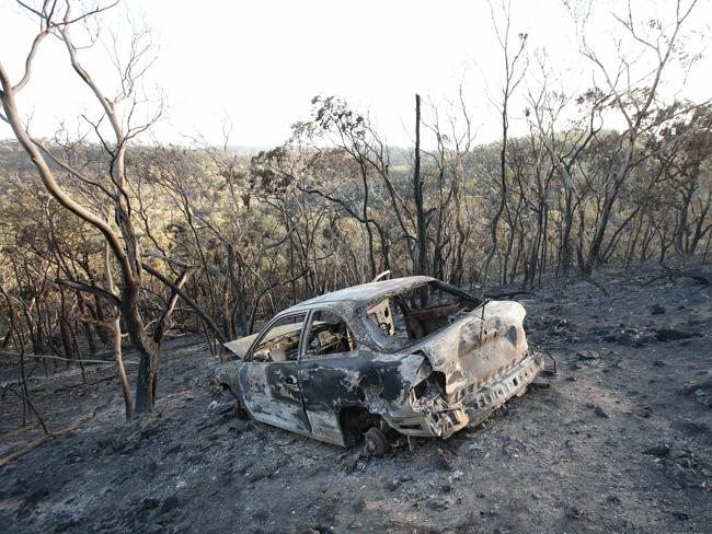 Charred remains ... A car burntout on Airstrip Road, Sampson Flat. Pic: Tait Schmaal