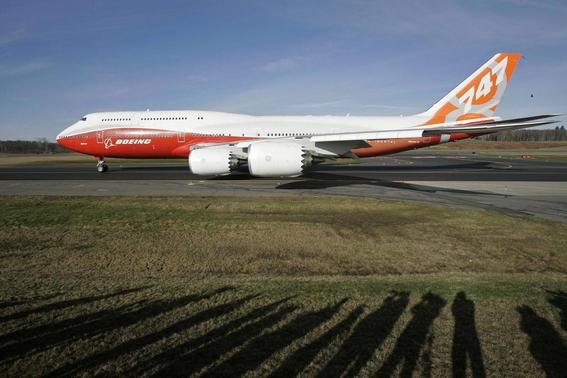 The Boeing 747-8 Intercontinental taxis down the runway before its maiden flight from Paine Field, in Everett, Washington, in this file photo taken March 20, 2011.   REUTERS-Robert Sorbo