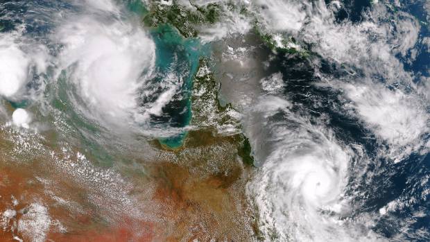 DOUBLE CYCLONES: An earlier satellite image of Cyclone Lam in the Arafura Sea over the Northern Territory and Cyclone Marcia off the east coast of Queensland.