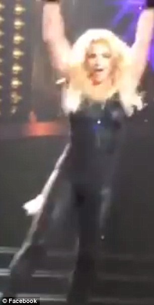 Oops! Showgoers detected a section of her blonde hair caught on her skintight trousers and recorded the mishap on video