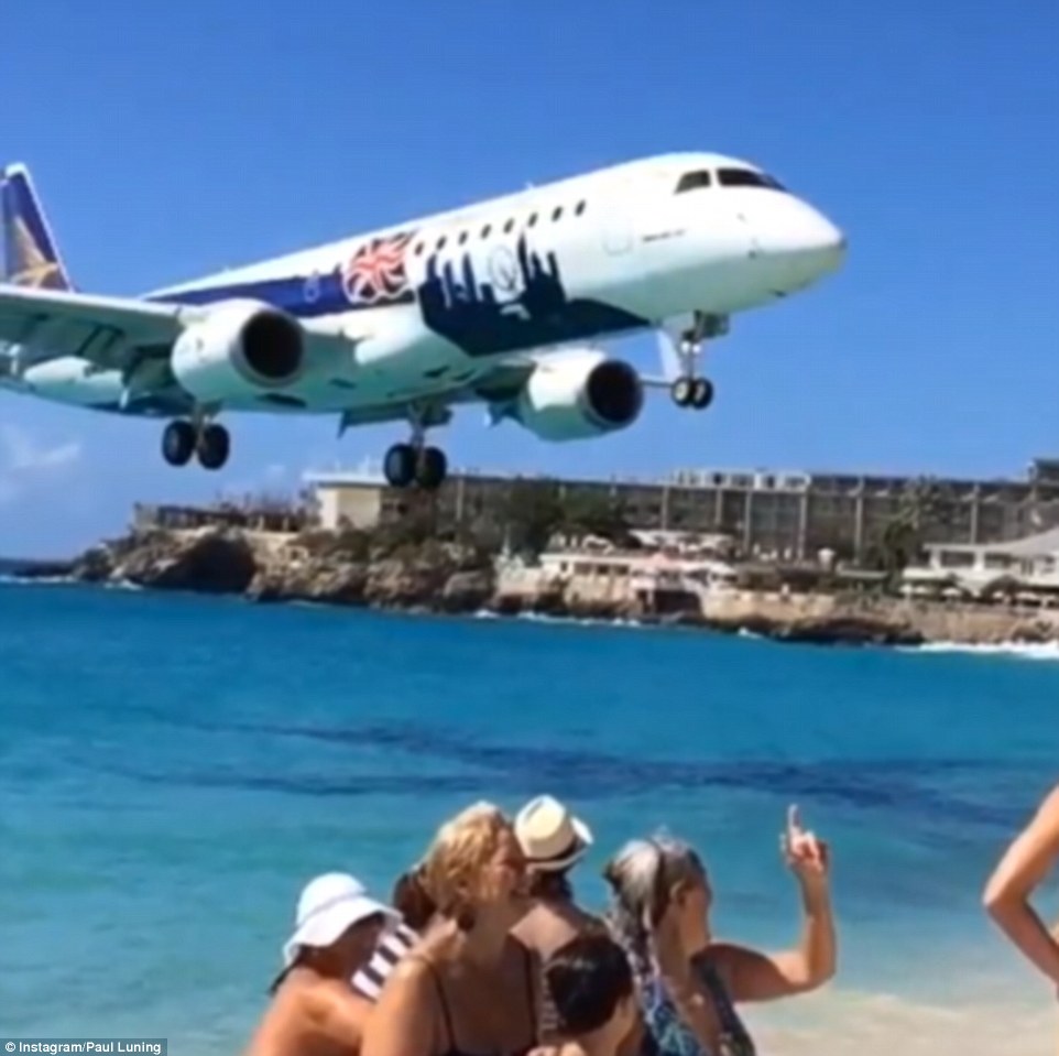 The aircraft is captured in slow motion as it approaches Princess Juliana International Airport in Saint Martin