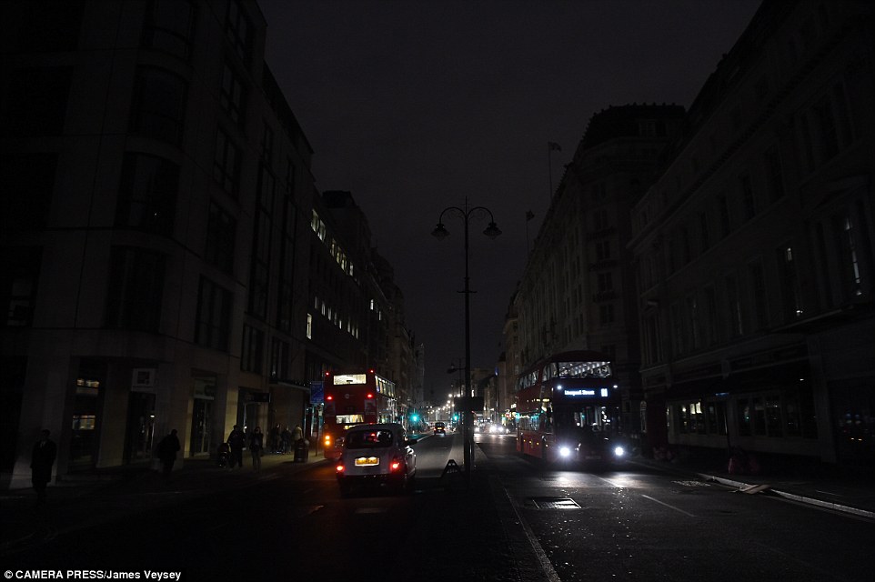 Blackout: The Strand pictured in darkness after power was cut to the area while emergency services dealt with the underground electrical fire