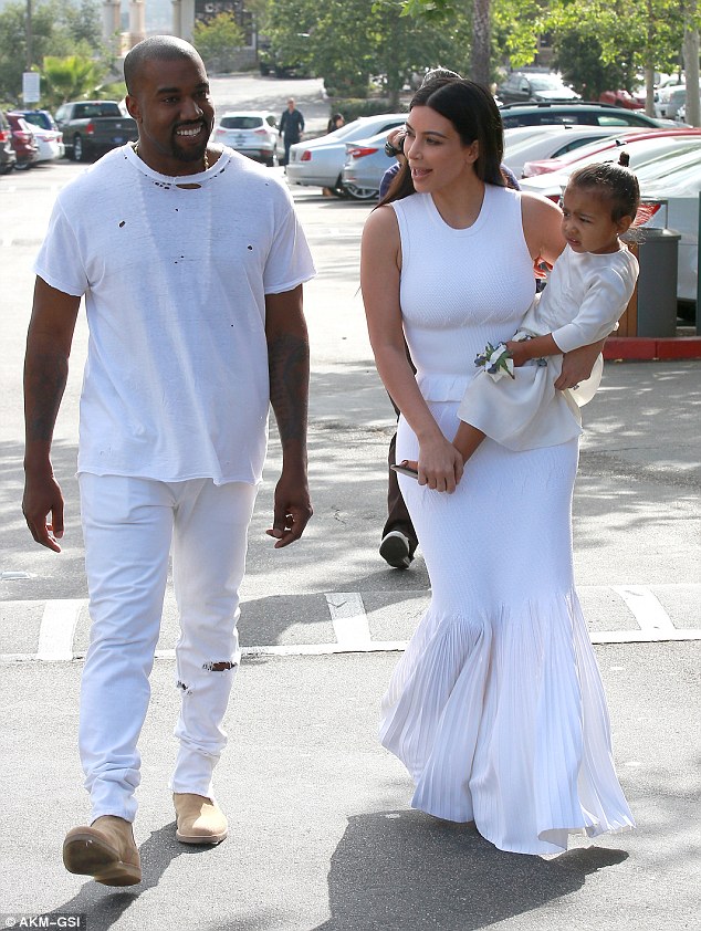 The look of love: Kanye shared a wide smile with his leading lady