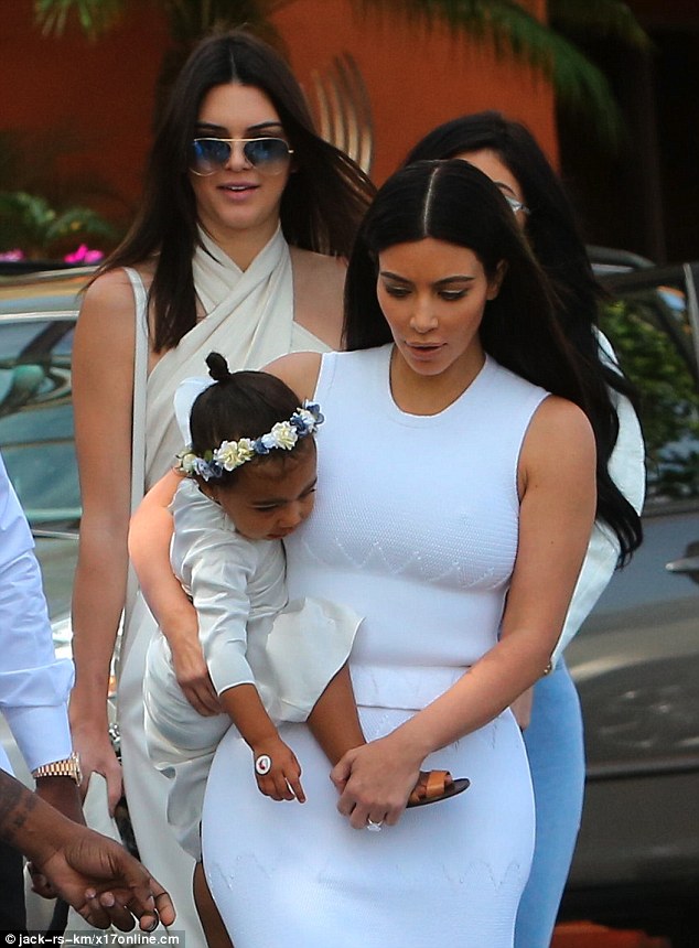 Attached at the hip! The reality star's daughter was surrounded by her family