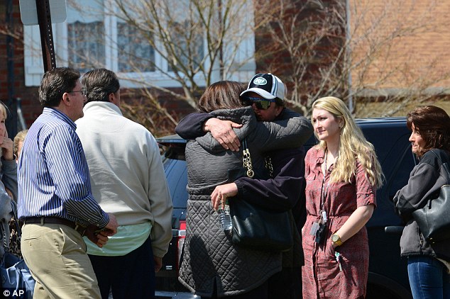 100-year-old Michael Juskin allegedly killed his wife Rosalia, 88, with an axe while she slept before he committed suicide with a knife on Sunday night. Visibly upset neighbors gathered in front of their Bergen County, New Jersey house on Monday morning 