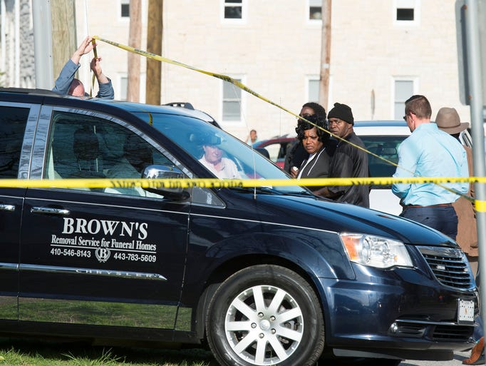Brown's Removal Service transports bodies from a scene