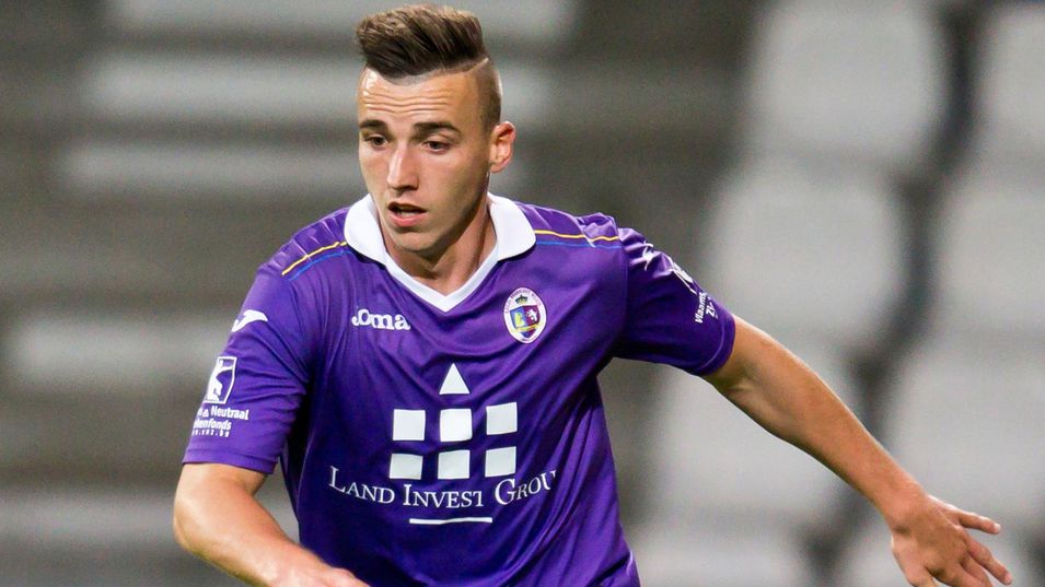 File - In this Aug. 16, 2014 file photo, Beerschot-Wilrijk player Tim Nicot kicks the ball during a match against KRC Gent Zeehaven in Antwerp, Belgium. A 23-year-old defender from a lower-league soccer club has become the second Belgian player to die of cardiac arrest in less than two weeks. Antwerp-based team Beerschot-Wilrijk says Tim Nicot died Monday, May 11, 2015 after collapsing during a match last week. He was taken to the Antwerp university hospital, where he had been kept in an artificial coma. In April, Gregory Mertens, a 24-year-old defender from Lokeren, also died from cardiac arrest during a reserve-team match. (AP Photo/Walter Saenen, File)