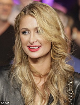 Hot ticket: Paris Hilton entered the arena to sit alongside the likes of Liev Schreiber in the star-studded audience